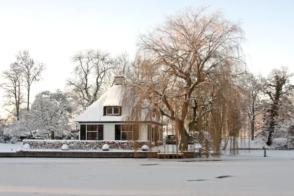 stock image Snowy house in a Dutch Winter landscape