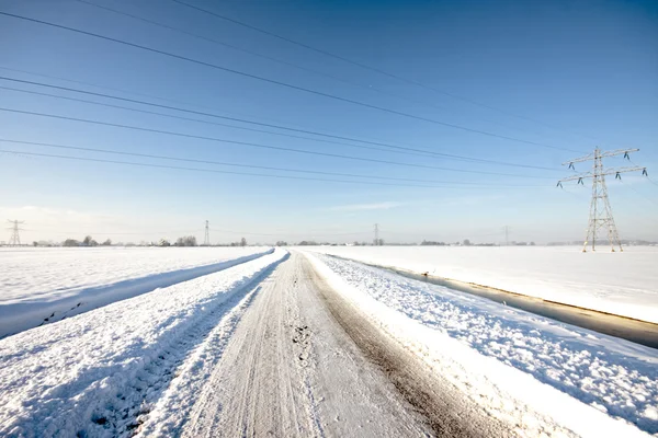 Snowy countryroad in the countryside from the Netherlands — Stock Photo, Image