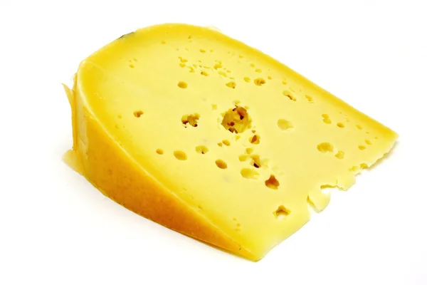Pedazo de queso con agujeros de los Países Bajos aislados en blanco — Foto de Stock