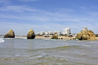 Alvor at the beach Tres Irmaos in the Algarve in Portugal clipart