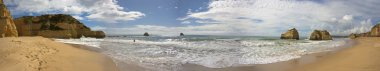Panoramic view at the famous beach at Praia da Rocha in the Algarve in Portugal clipart
