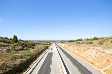 Highway A22 in the Algarve Portugal clipart