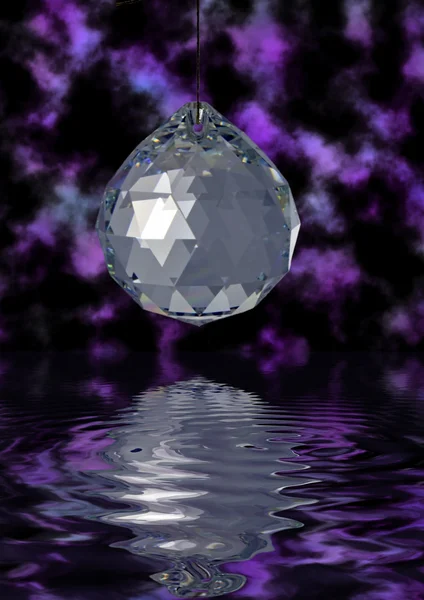Crystal ball reflecting in water — Stock Photo, Image