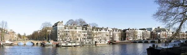 Panoramautsikt över cityview med stopera och amstel i amsterdam Nederländerna — Stockfoto