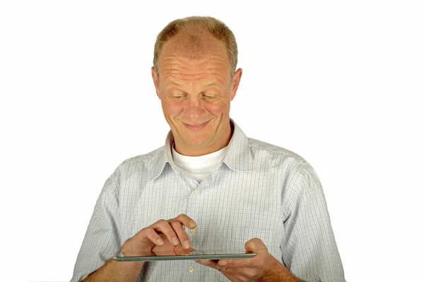 Diví se člověk při pohledu na jeho tabletový počítač — Stock fotografie