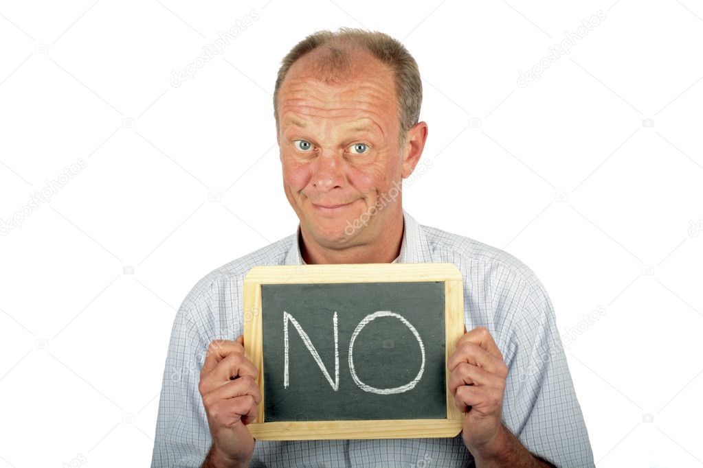 Thoughtfull man showing a sign with '' NO'' written on it