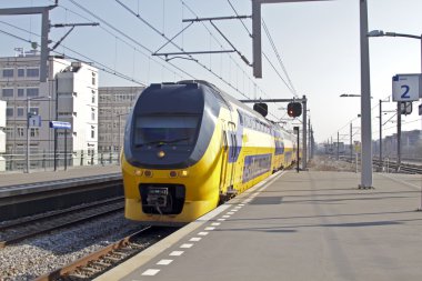 Train arriving at Bijlmerstation in Amsterdam the Netherlands clipart