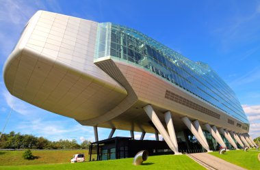 Futuristic glass building in Amsterdam the Netherlands clipart