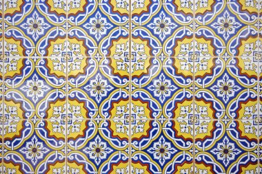 Tile pattern in blue, yellow and white in Portugal clipart