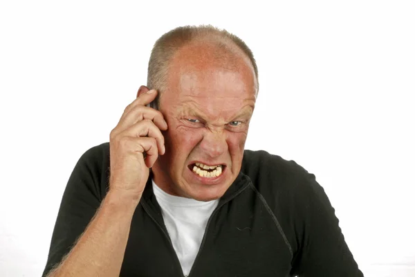 Θυμωμένος άνθρωπος στο τηλέφωνο — Φωτογραφία Αρχείου
