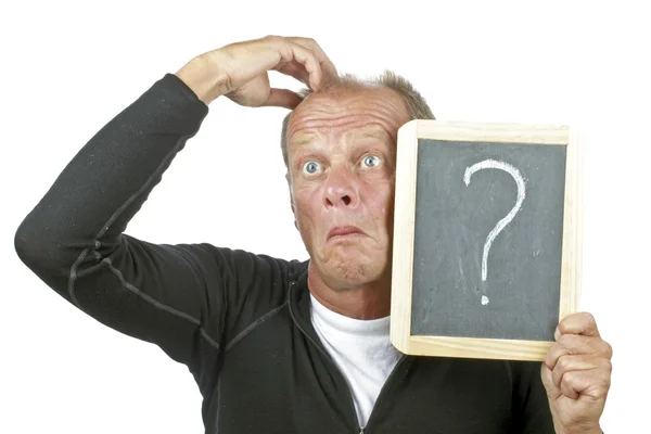 Mann mit Kreidetafel mit Fragezeichen überrascht — Stockfoto
