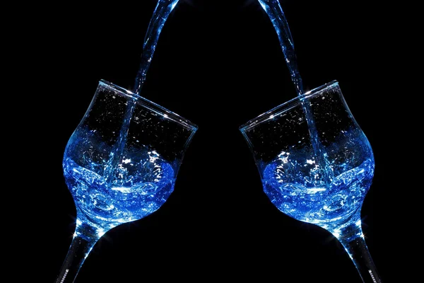 Blue curacao liquor pouring into a glass — Stock Photo, Image