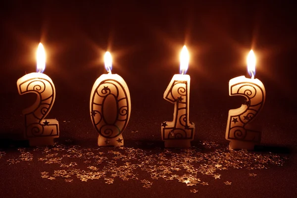Счастливый 2012 год - горят свечи — стоковое фото