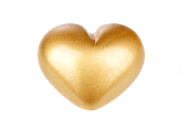 Coração dourado sobre um fundo branco — Fotografia de Stock