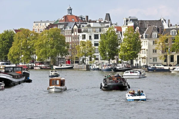 Classical Amsterdam view at the harbor from Amsterdam in the Netherlands — Stock Photo, Image