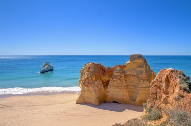 Natural rocks at Alvor Portugal clipart