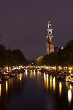 Amsterdam at night in the Netherlands clipart