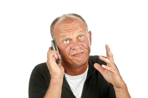 Чоловік розмовляє на мобільному телефоні і жестикулює — стокове фото