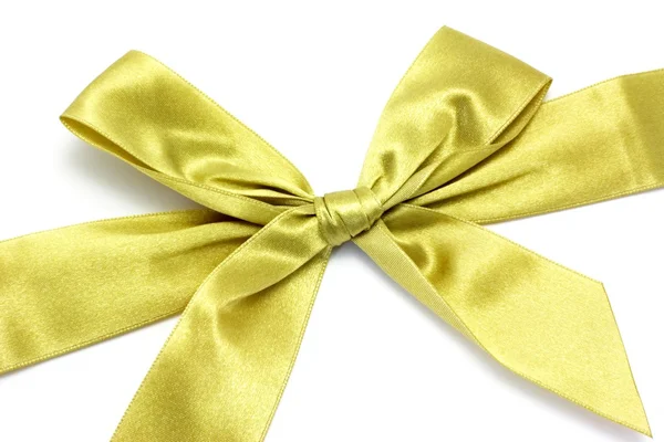 Gold ribbon with bow — Stock Photo, Image