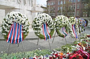 Wreaths on the Dam square during remembrance day in the Netherla clipart