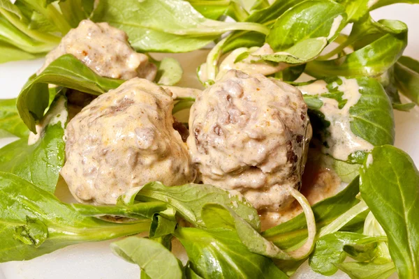 stock image Meatball on salad