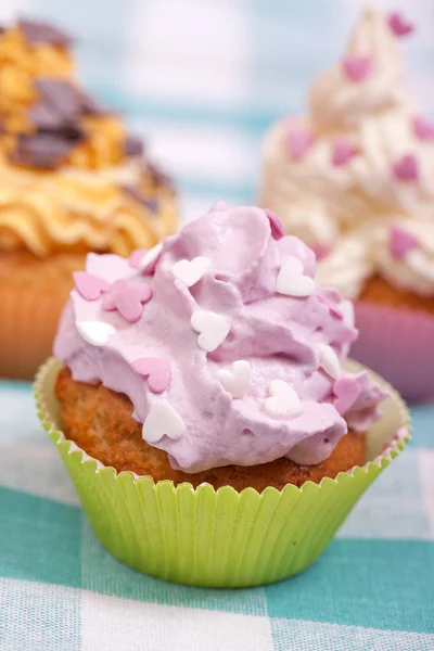 Három cupcakes és hinti — Stock Fotó