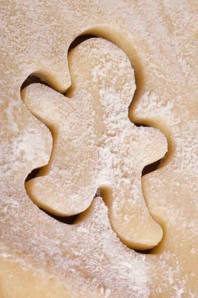Cutting cookies gingerbread man — Stock Photo, Image