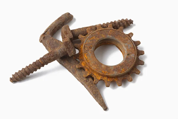 Rusty bults and cogwheel — Stock Photo, Image