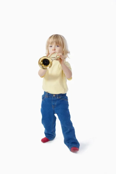 Fiú játék-trombita — Stock Fotó