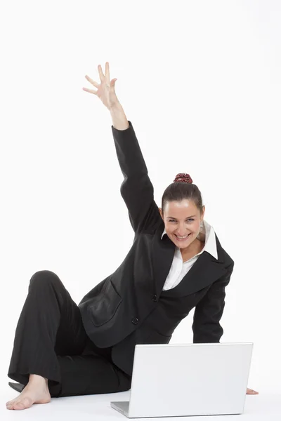 Woman with computer cheering — Stock Photo, Image