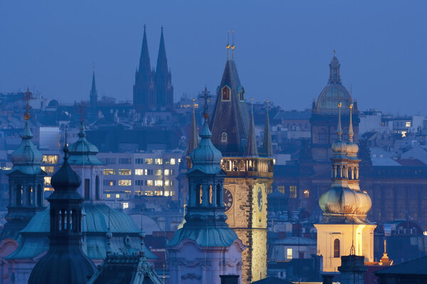 Czech republic, prague - towers of the old town and national musem at dusk