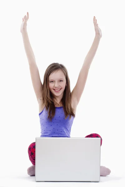 Woman with computer cheering — Stock Photo, Image