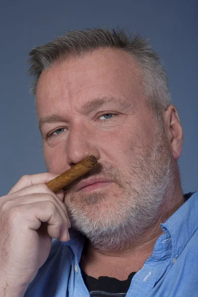 Man with a cigar — Stock Photo, Image