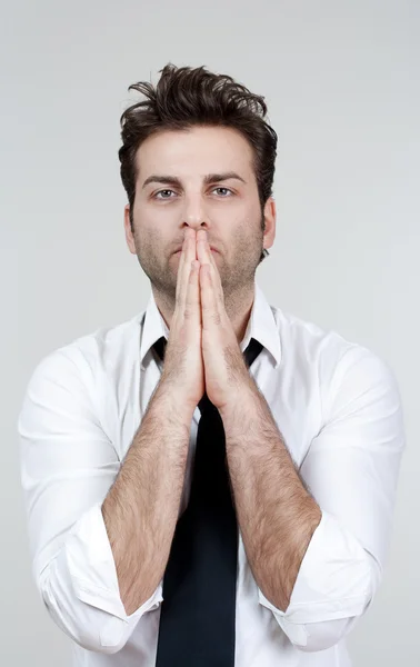 Biznesmen modląc się — Zdjęcie stockowe