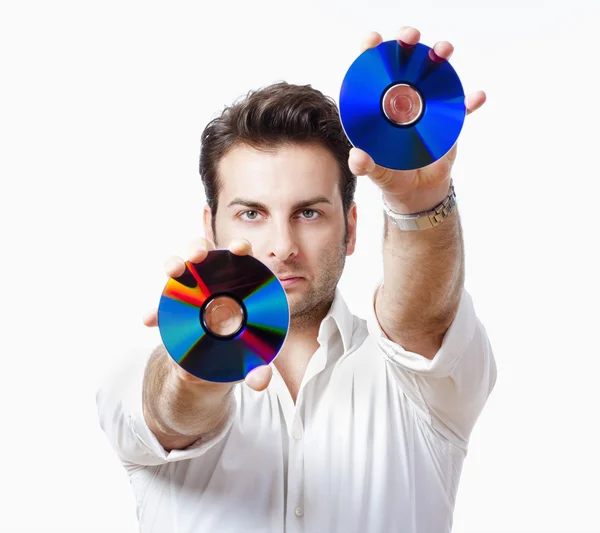 Hombre sosteniendo CD —  Fotos de Stock