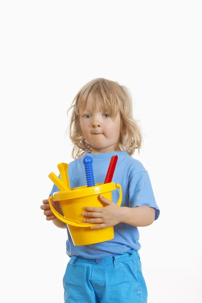 Niño con juguetes de playa — Foto de Stock