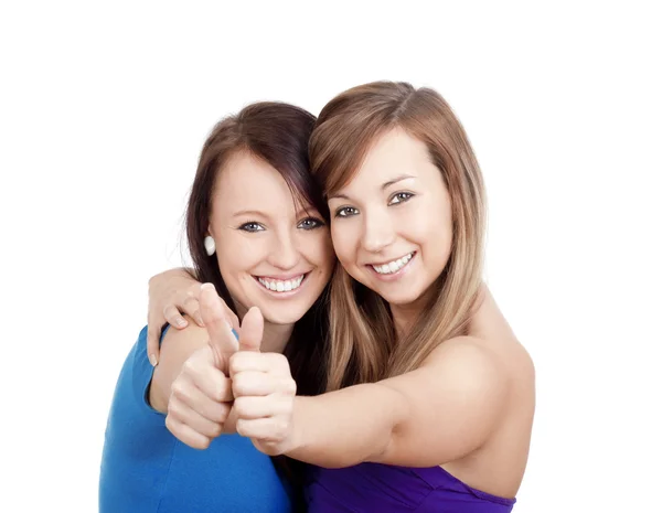 Meninas mostrando polegares uo — Fotografia de Stock