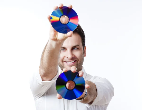 Hombre sosteniendo un cd —  Fotos de Stock