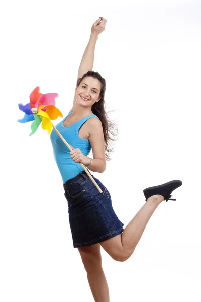 Woman with pinwheel — Stock Photo, Image