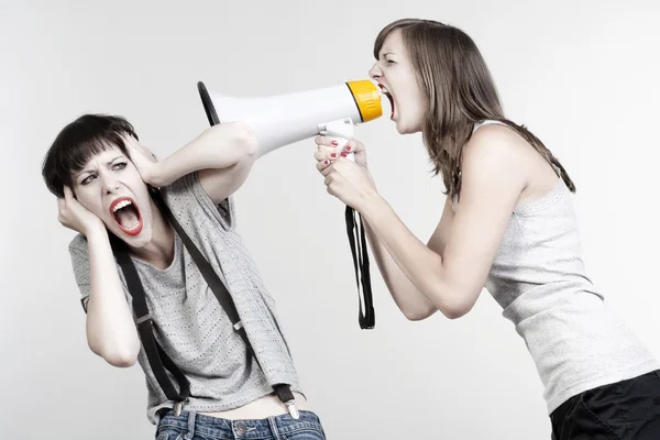 Girls with a megaphone — Stock Photo, Image