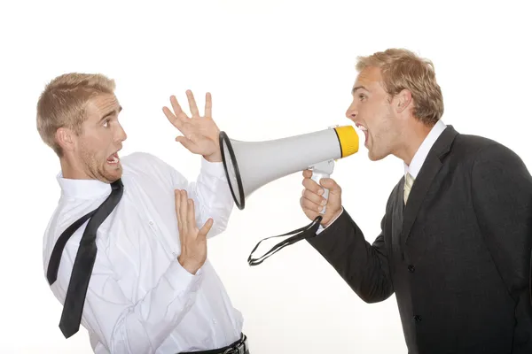 Boss yelling into megaphone — Stok fotoğraf