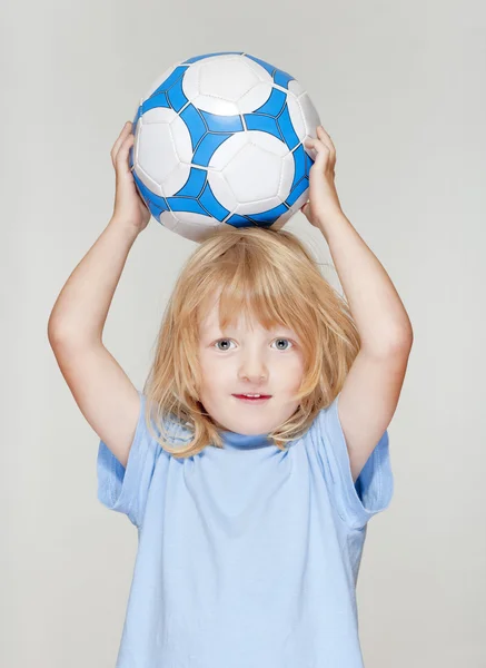 stock image Boy holding football