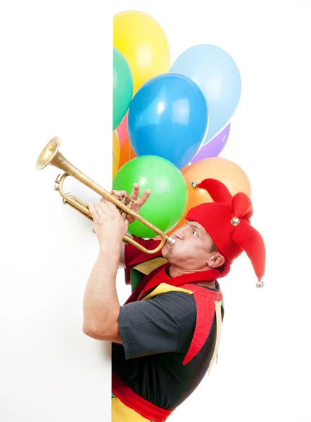 Jester blowing trumpet — Stock Photo, Image
