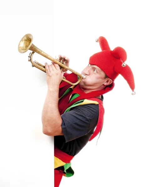 Jester blåsa trumpet — Stockfoto
