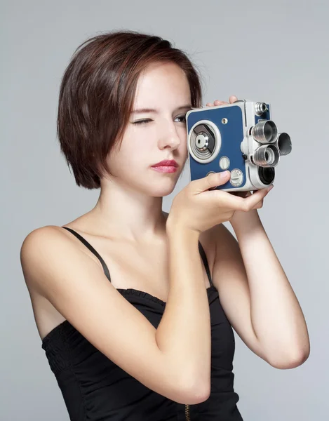 Girl with film camera — Stock Photo, Image