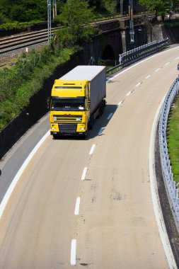 Truck on highway clipart