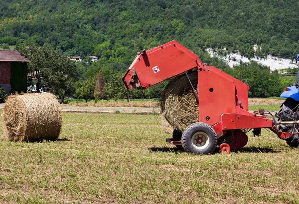 stock image Machine for bales of hay