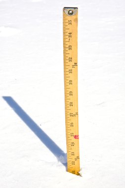 Yardstick measuring Snow clipart