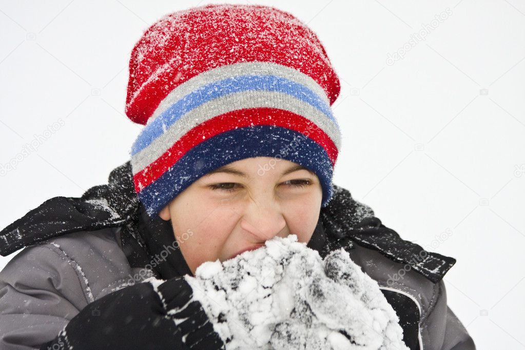 Boy Playing in Snow
