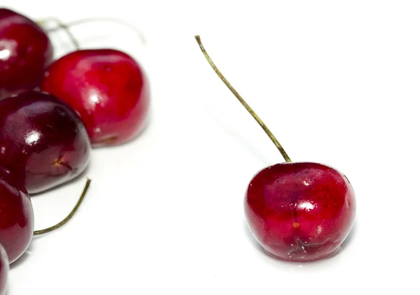 Few Red Cherries on White — Stock Photo, Image